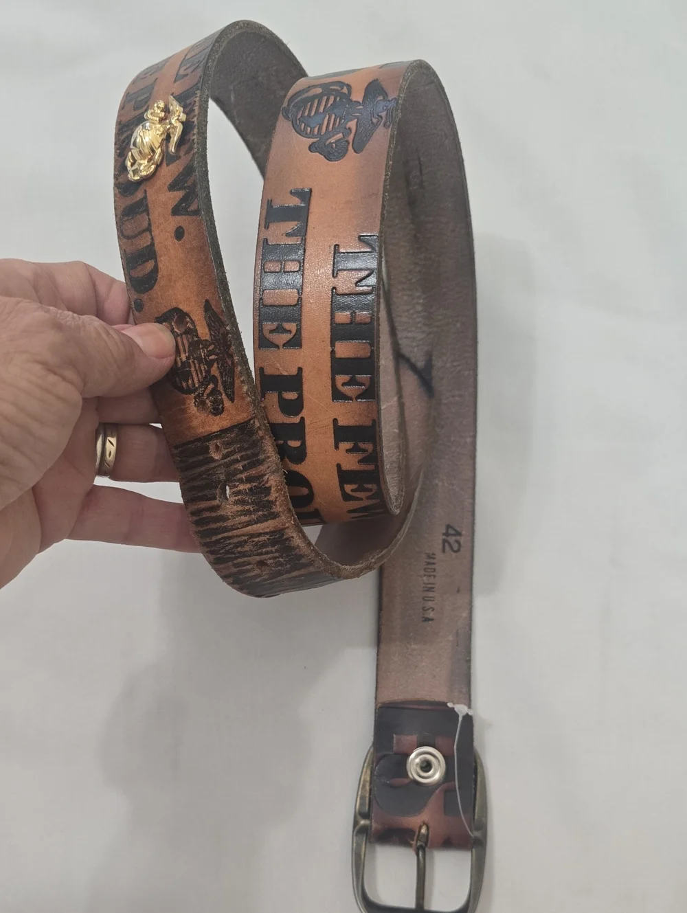 Vintage Tan Leather Men's Belt with Embossed Text and Brass Accent